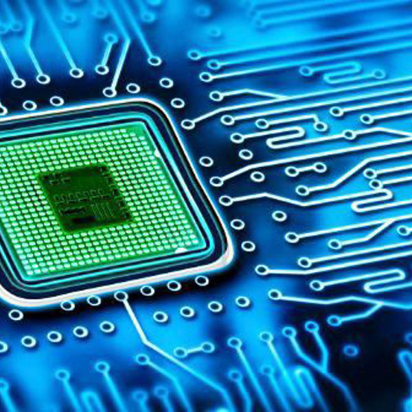 green chip on blue circuitboard