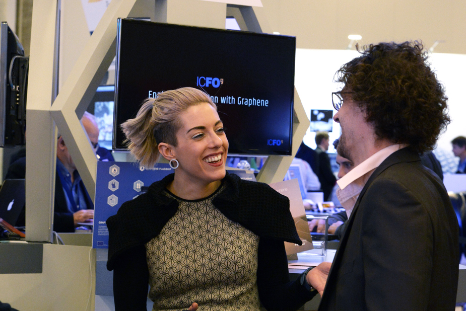 A reasercher explains her prototype at the Graphene Experience Zone at Mobile World Congress 2017