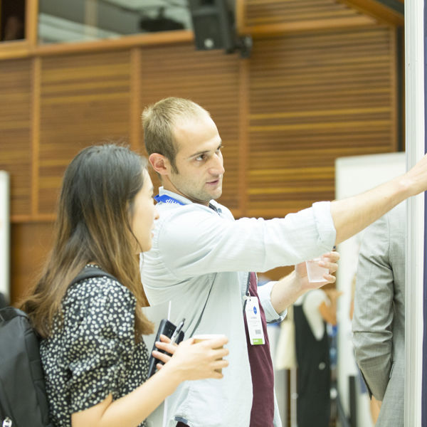 Two conference attendes at poster session